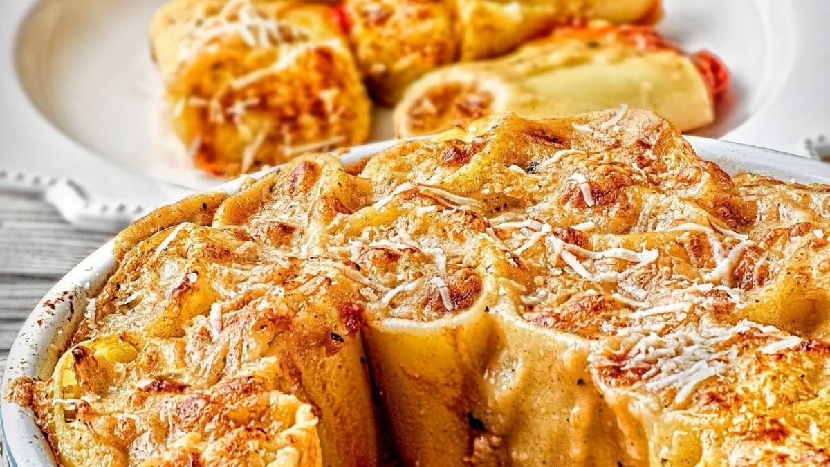 Paccheri gratinati con ragù di pesce pregiato: il mare incontra il Natale