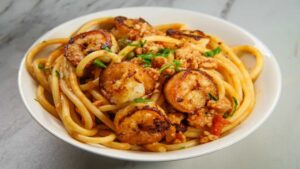 Spaghettone al forno con ragu di crostacei