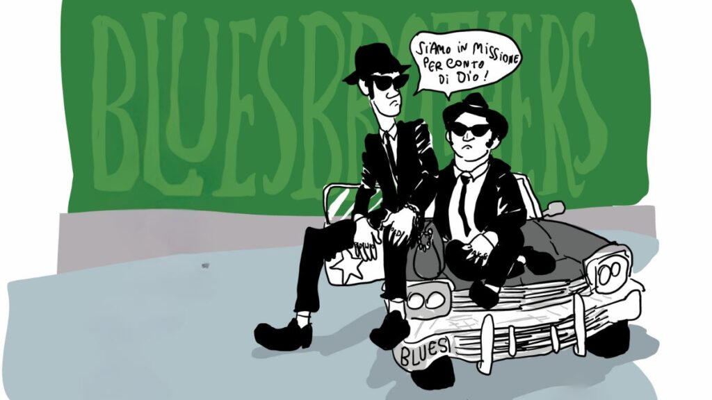 Occhiali scuri, cappello nero e un cuore che suona il blues così si parla di Dio