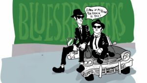 Occhiali scuri, cappello nero e un cuore che suona il blues così si parla di Dio